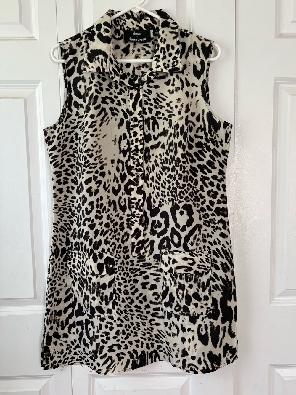 Dennis Brasso sleeveless shift dress in animal print.